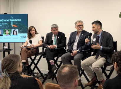 Image of four panelists at a Climate Week panel.